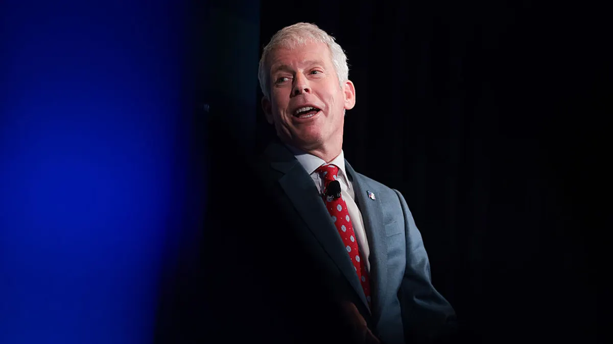 U.S. Energy Secretary Chris Wright speaks, pictured against a dark background.