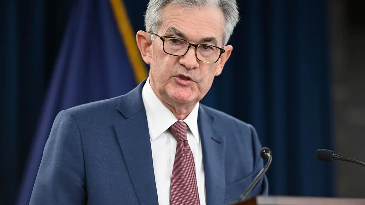 Jerome Powell, Federal Reserve chair, speaks from a podium
