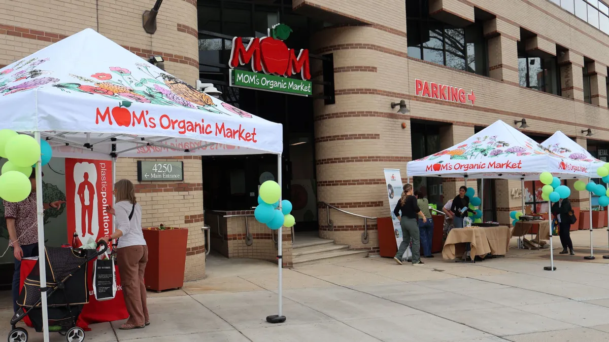 Exterior of Mom's Organic Market's Van Ness, Washington, D.C., store location on opening day, April 4, 2025