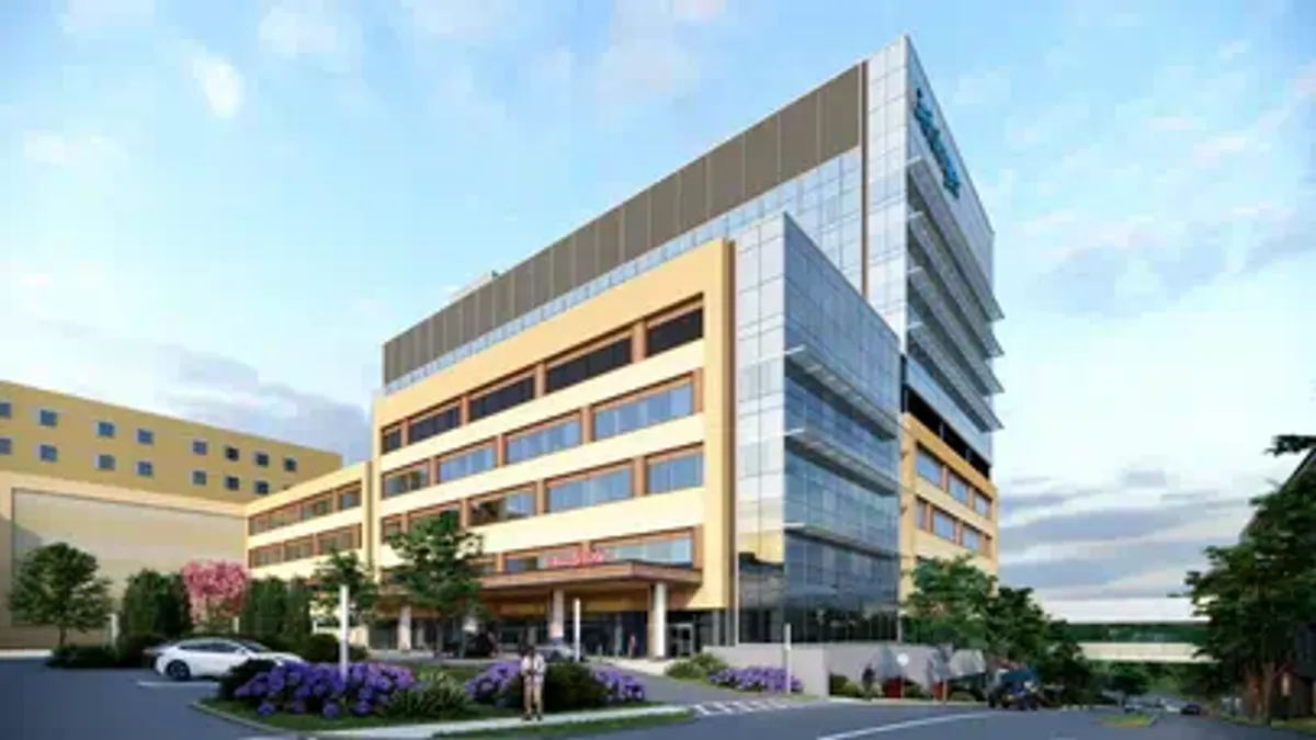 A rendering of a large building in the background, with a parking lot at the front.