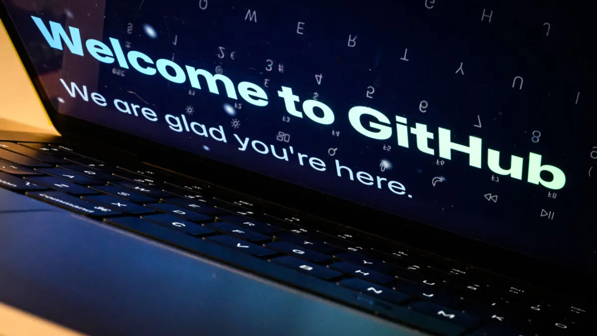 A laptop screen displays welcome screens and messages on the Github developer platform website, on Feb. 23, 2024 in London, England.