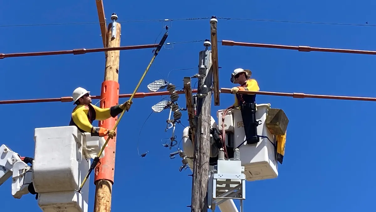 A FirstEnergy crew upgrades a power line in southern York County, Pennsylvania.