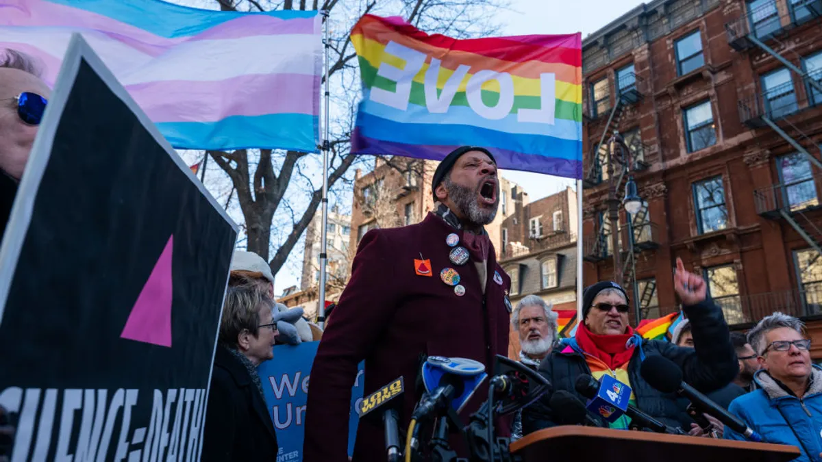 People during a rally outside of The Stonewall Inn