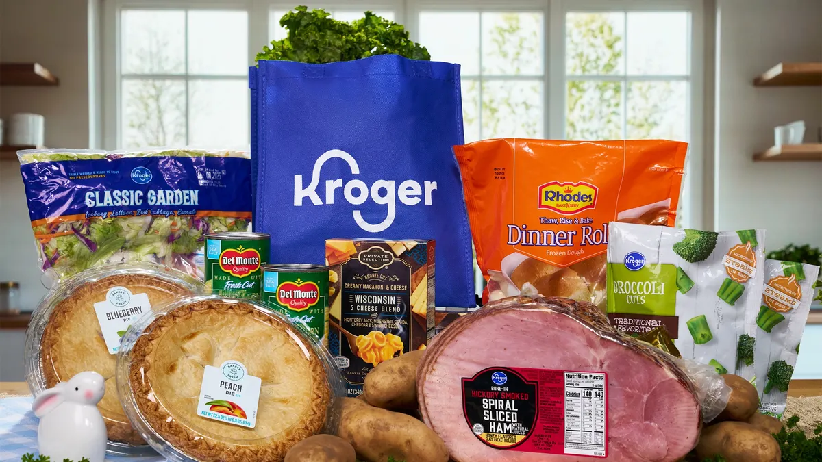 Several grocery items such as pies, ham and frozen broccoli bags.