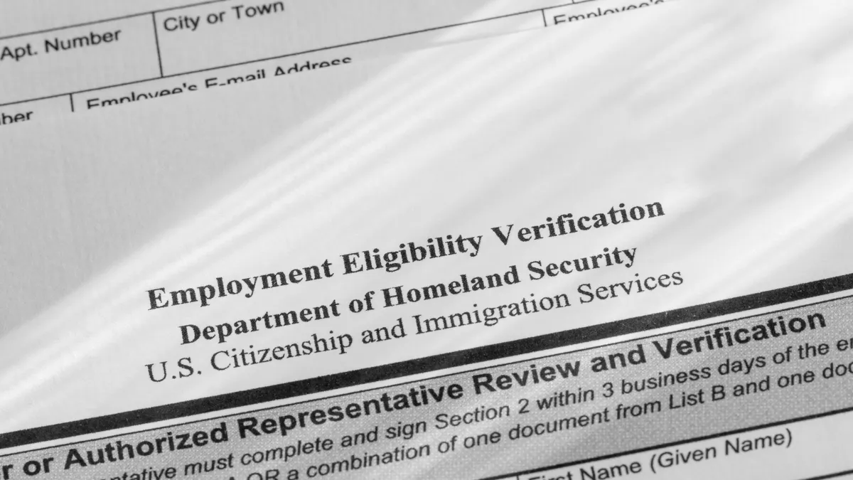 Close up view of Form I-9 United States employment authorization paperwork